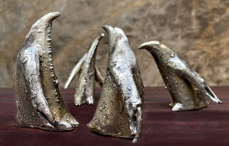manchots en bronze